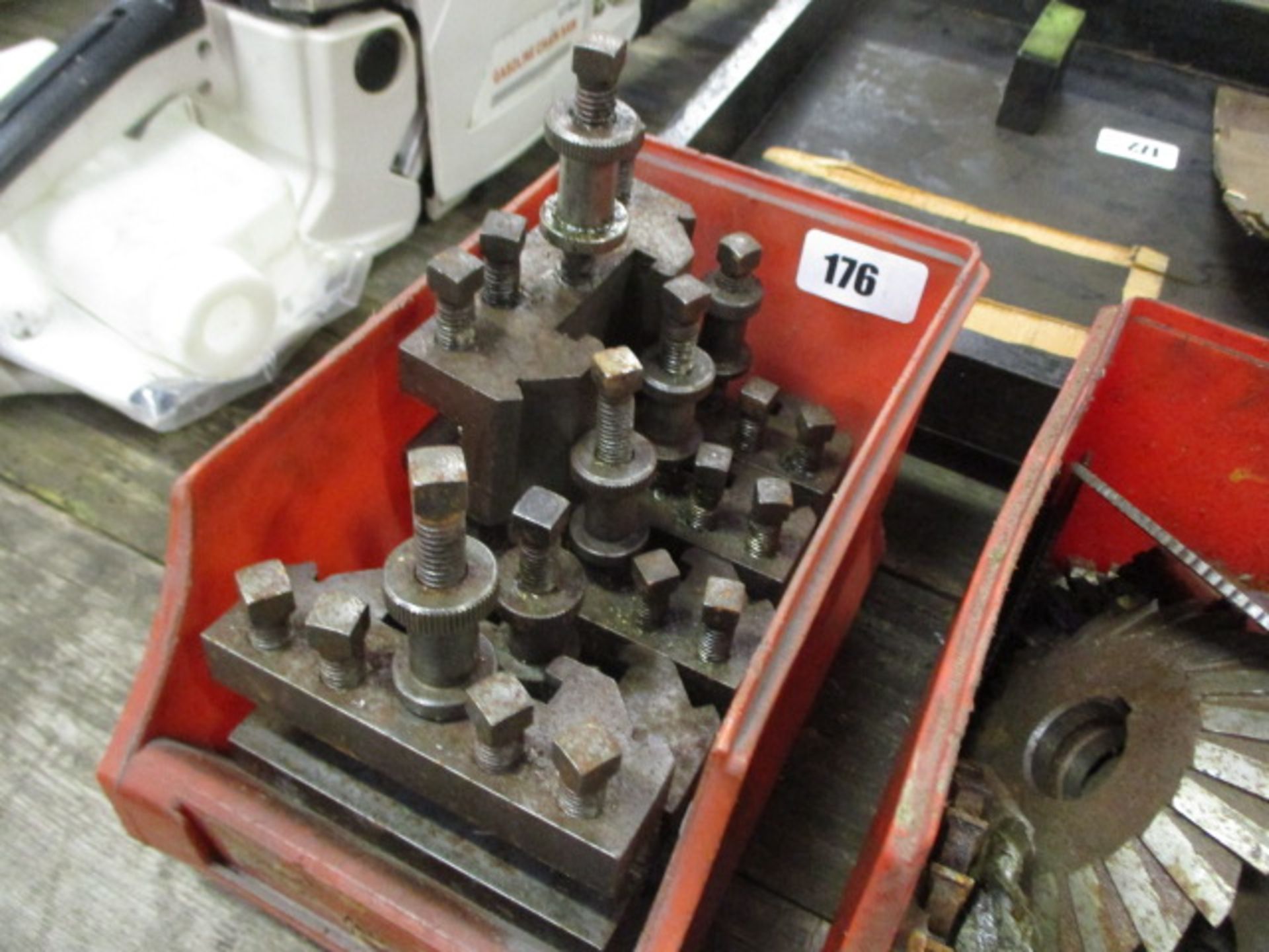 Small linbin containing machine table clamps