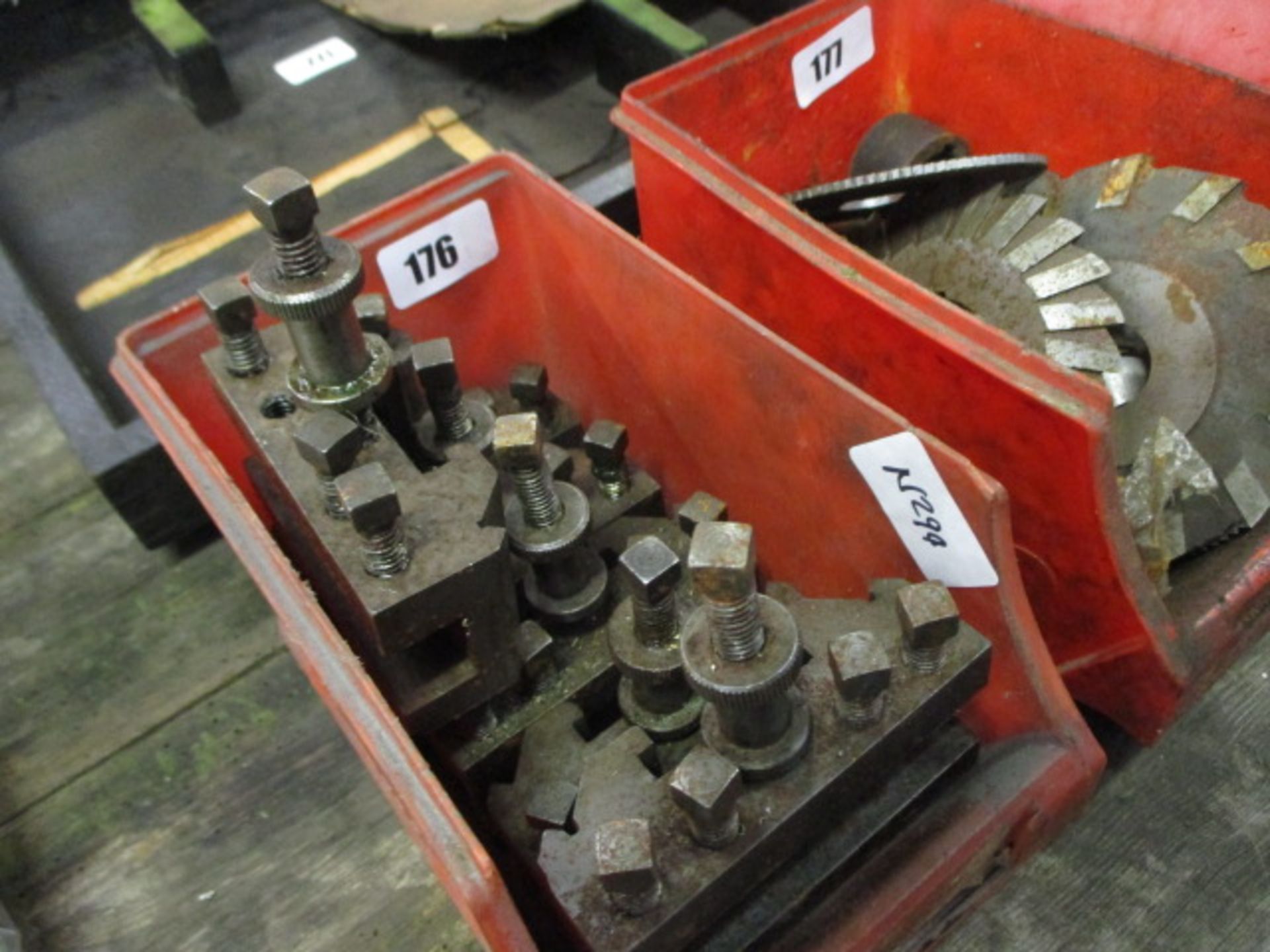 Small linbin containing machine table clamps - Image 2 of 2