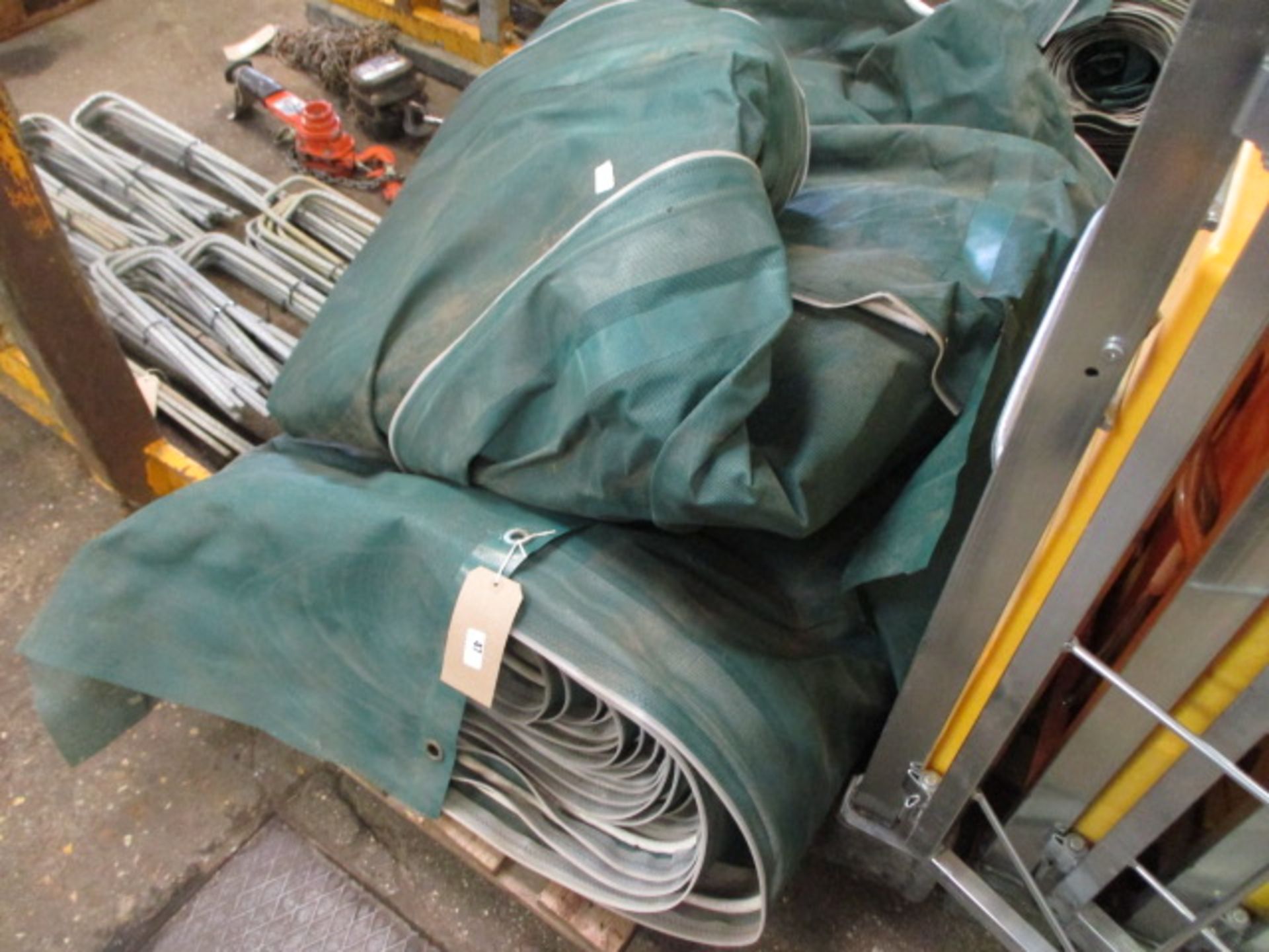 Pallet with 2 large scaffold ballistics nets in green