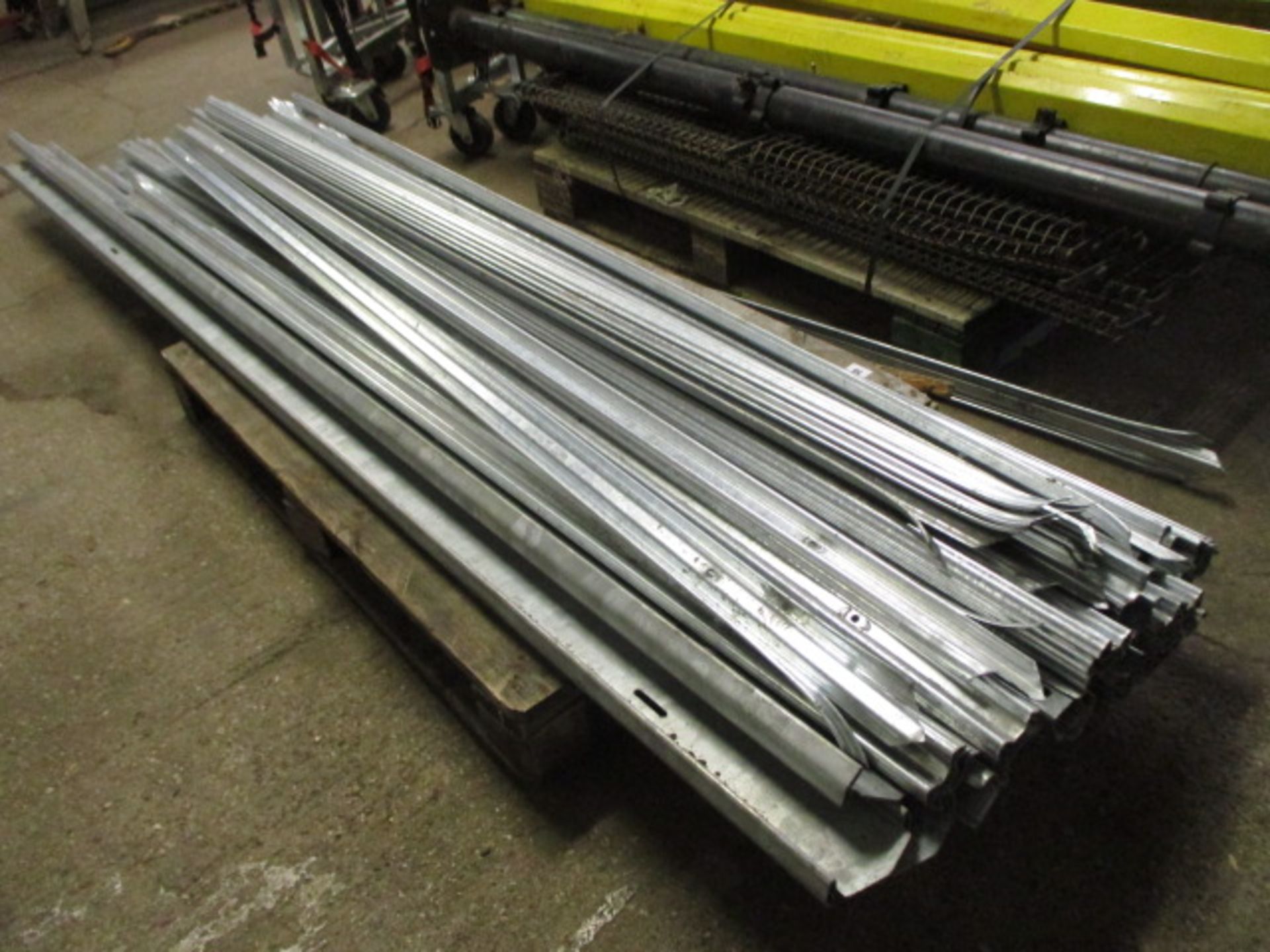 Pallet containing palisade galvanized fencing, approx. 9m length