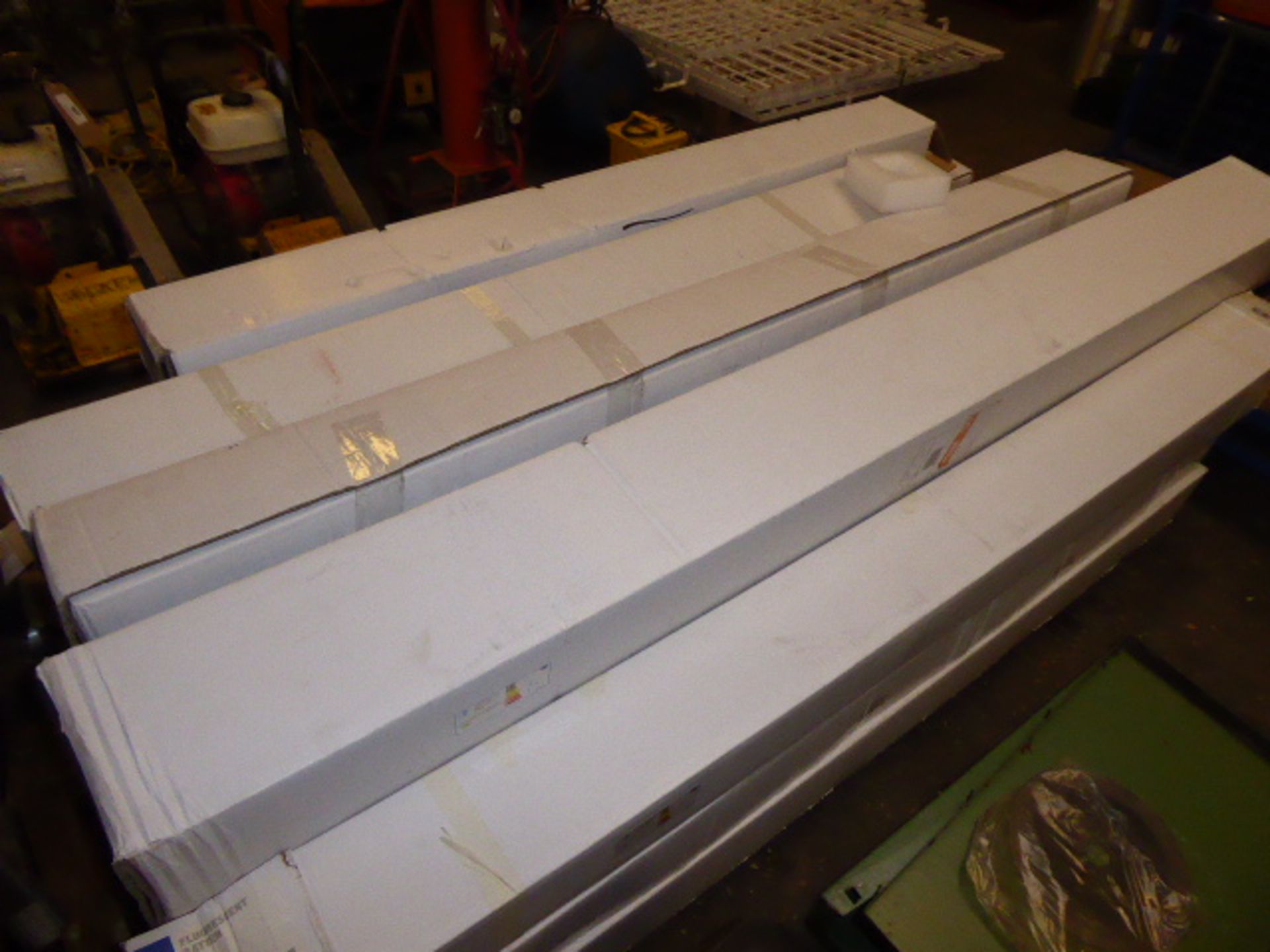 Pallet of strip lighting, mainly fluorescent, some LED