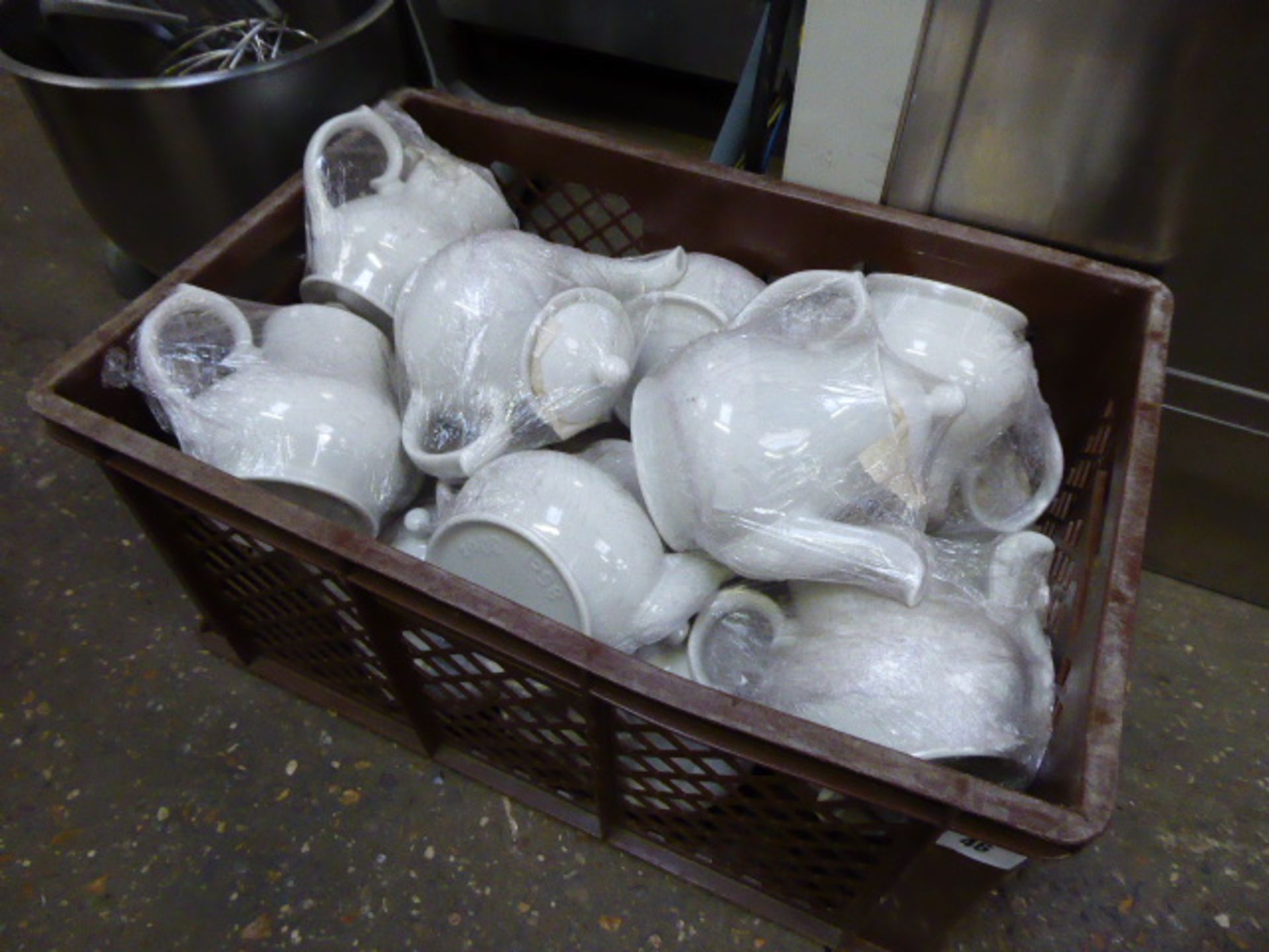 Large brown crate containing Churchill white teapots