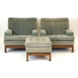 A pair of 1970's pale green button upholstered armchairs with teak frames,