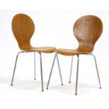 A pair of 1960's bentwood stacking chairs on metal tubular legs designed by Farfalla Design