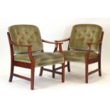 A pair of 1970's lounge armchairs,