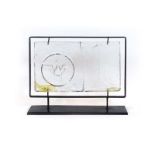 Erik Hoglund for Kosta Boda, a glass sculpture on a black metal frame, retailed by Illums Bolighus,