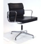 After Charles and Ray Eames, a 'Softpad'-type executive desk chair with black upholstery,