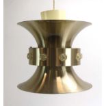 A 1970's brushed steel ceiling light with a central raised band and perspex roundels