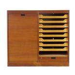 A Danish teak double tambour cabinet, w.