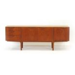 A McIntosh teak sideboard, the three drawers beside three doors, on four tapering legs, l.