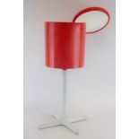 A 1970/80's red plastic sewing/dressing cabinet,