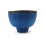 Abdo Nagi (1941-2001): a pedestal bowl, the mottled blue glaze with a bronzed rim,