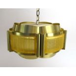 A 1970's brass coloured ceiling light with yellow 'bark' perspex sections CONDITION