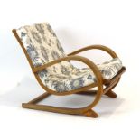 A 1930's Art Deco bentwood lounge armchair with a loose cushion,