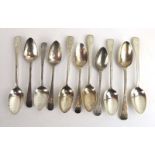 A harlequin set of eleven Georgian silver old English and brightcut engraved teaspoons,