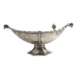 An early 20th century pierced silver covered dish of Aladdin's lamp form, makers mark indistinct,