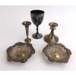 A silver wine goblet, a pair of pressed silver dishes,