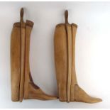 A pair of beech shoe trees by Tom Hill, Knightsbridge, one deficient of a foot,