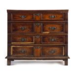 An early 18th century and later oak chest of four long drawers on block feet, w.