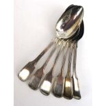 A set of six Victorian silver fiddle and thread pattern dessert spoons, maker CB, London 1863,