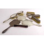 A mixed group of eleven silver backed hairbrushes and hand mirrors,