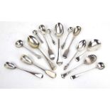 A mixed parcel of Georgian and later silver spoons including a fiddle pattern mustard spoon,