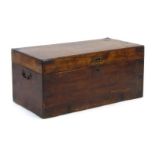 A 19th century mahogany campaign-type trunk with brass mounts and handles and a teak lined interior,