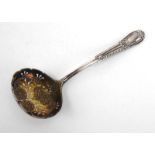 A Victorian silver and parcel gilt shell and thread pattern sifting spoon, Henry Holland,