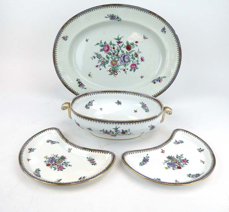 An extensive Spode dinner service decorated with floral sprays on a white ground