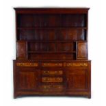 An 18th century oak and crossbanded dresser,