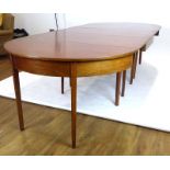 A George III mahogany dining table comprising of two D-ends,