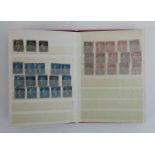 A stamp stock book including three Penny Blacks, a Two Penny Blue with no lines added,