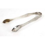 A pair of Georgian silver brightcut engraved sugar nips with acorn ends, Peter & Ann Bateman,