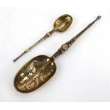 An Edwardian silver and parcel gilt dessert spoon in the form of an anointing spoon, maker CB,