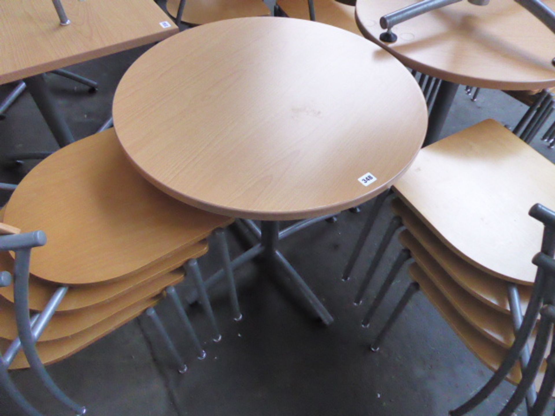 70cm diameter canteen-type table with set of 4 matching EFE stacking chairs