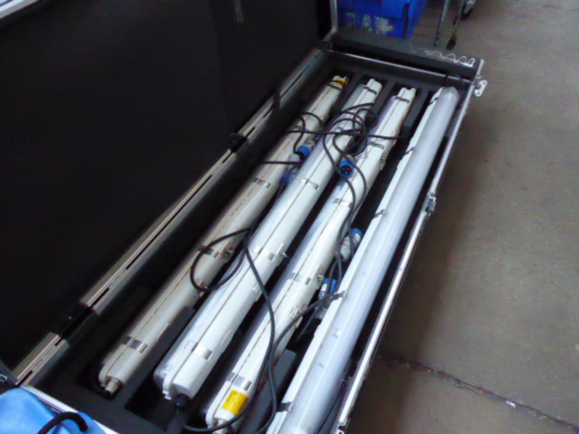 Two large aluminium bound transport cases on castors measuring 200cm by 70cm containing a quantity - Image 2 of 3