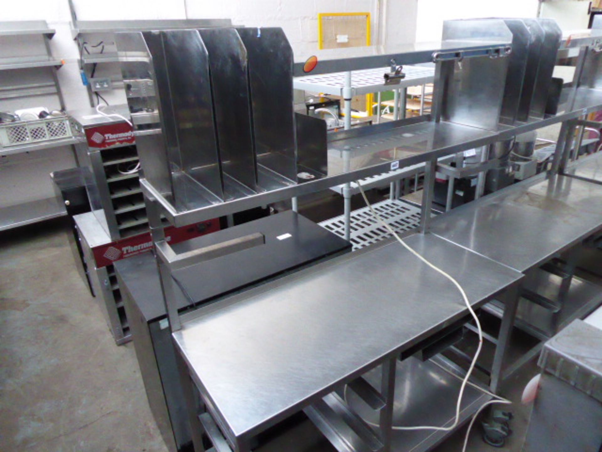 120cm stainless steel mobile preparation station with 2 shelves over, shelf under and space for