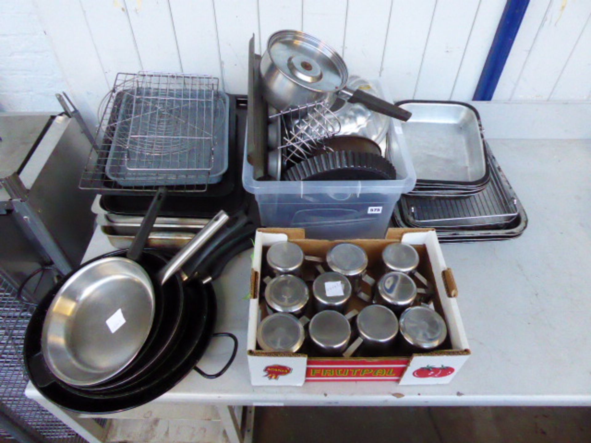 Small assortment of baking trays, latté jugs, saucepans and fry pans