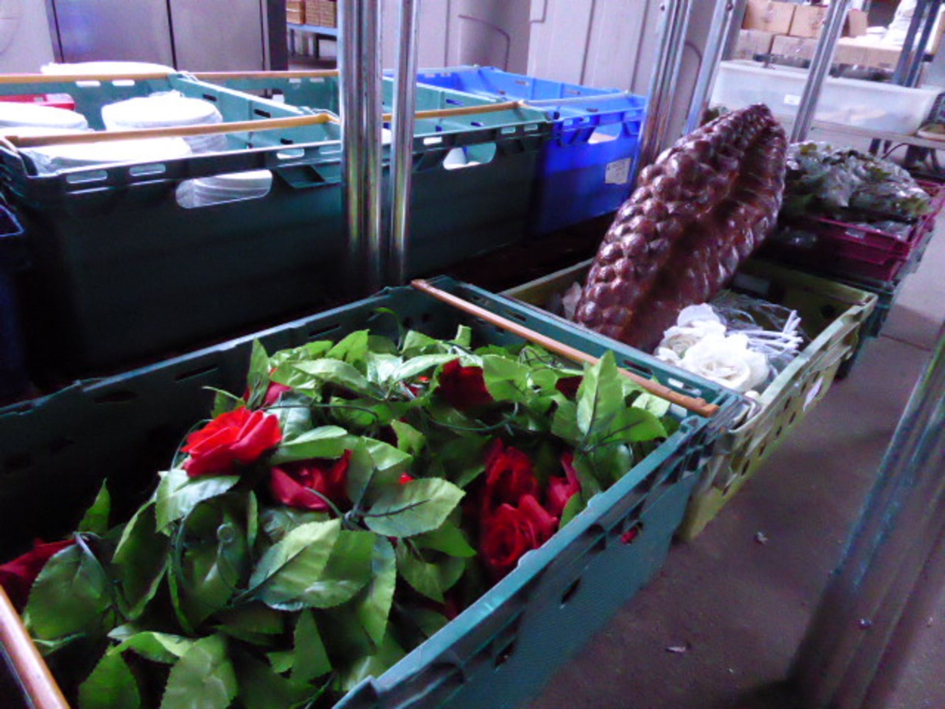 Three trays of artificial flowers