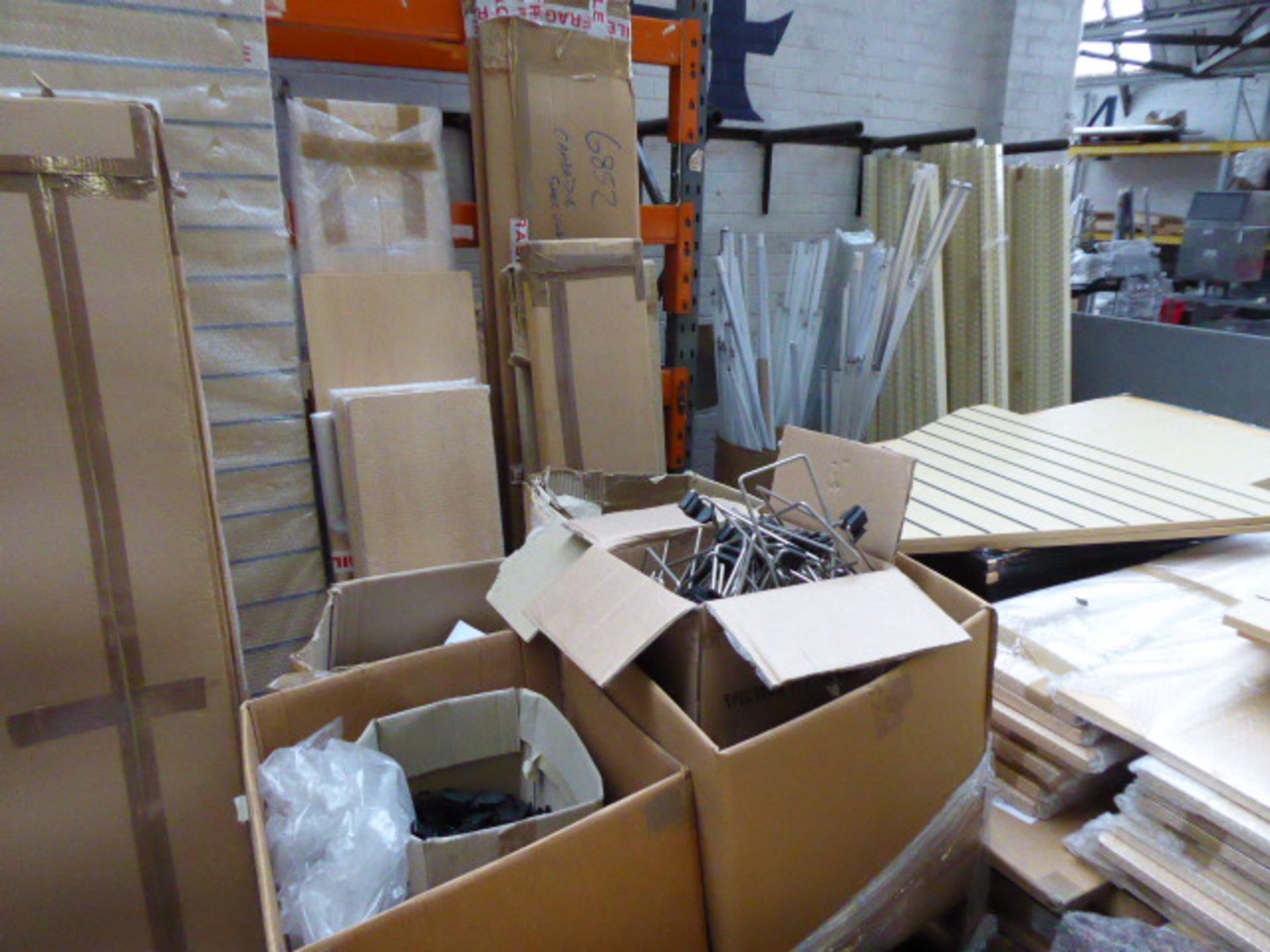 Large quantity of maple library style shelving and component parts. Includes approx. 6 pallets and a