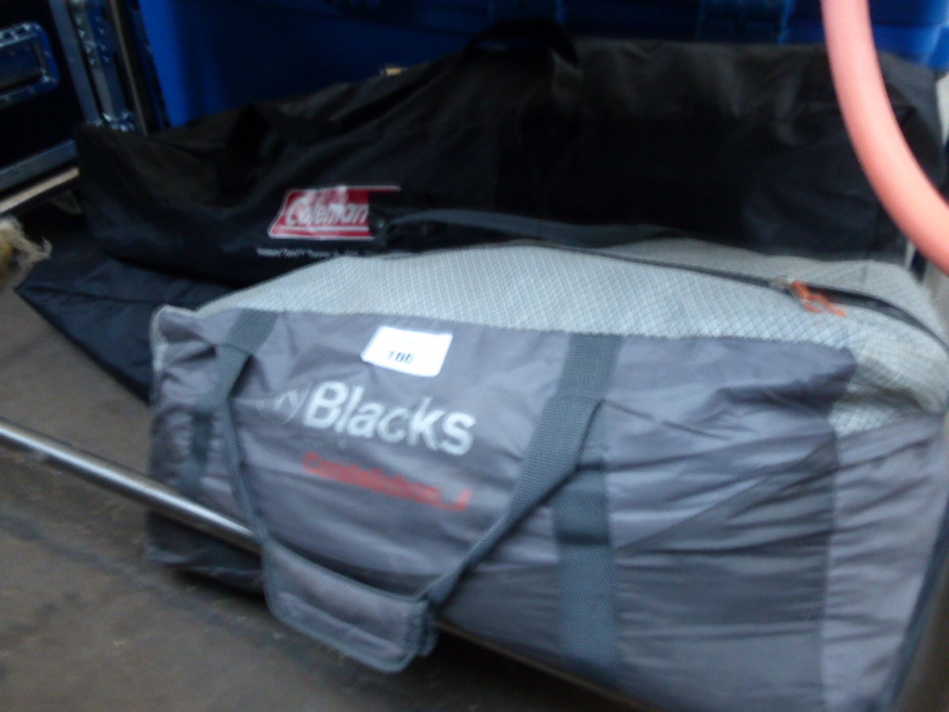 Three bags of assorted tent and tent parts