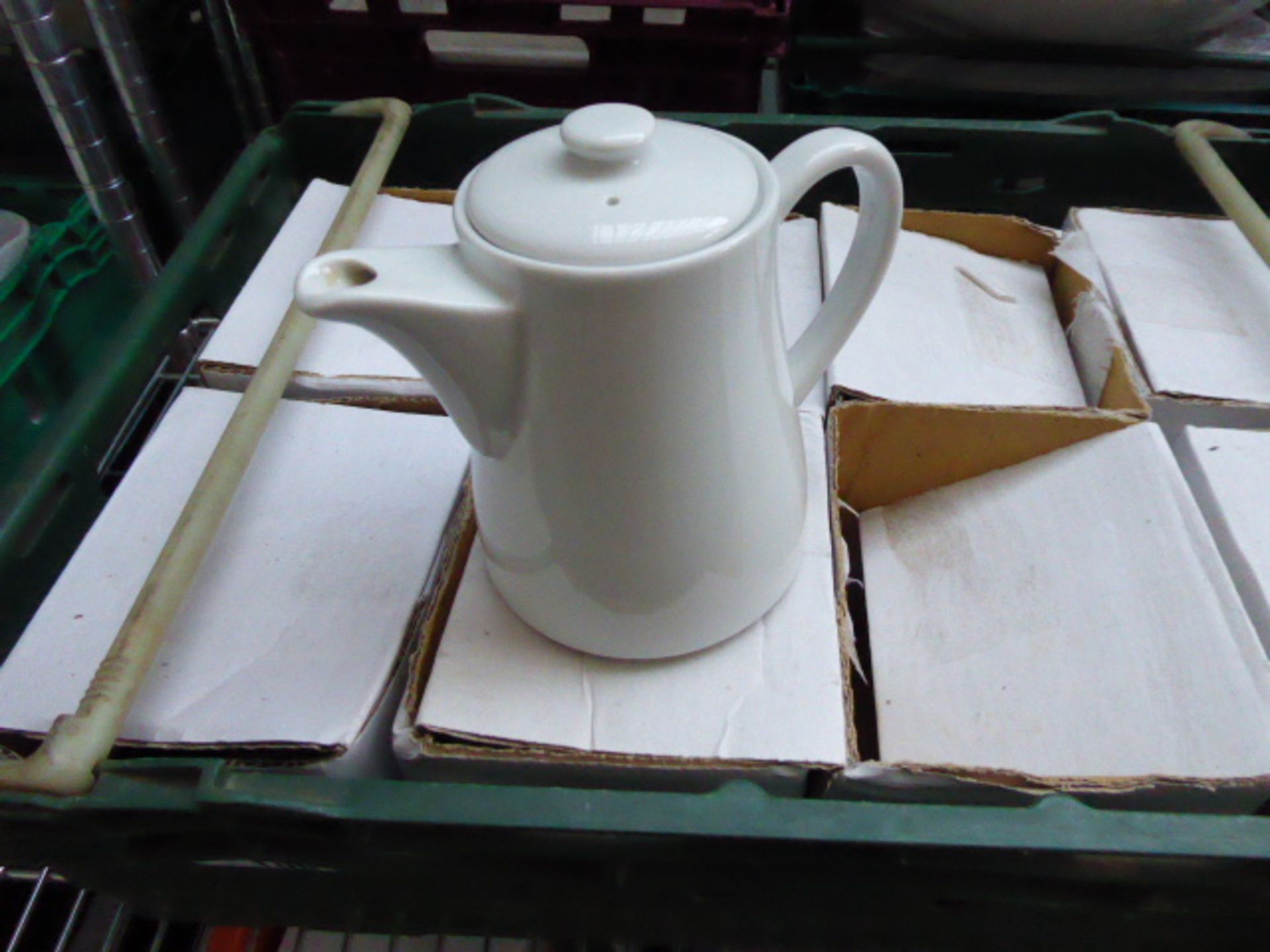 One green and one orange tray of white crockery teapots and coffee pots - Image 2 of 2