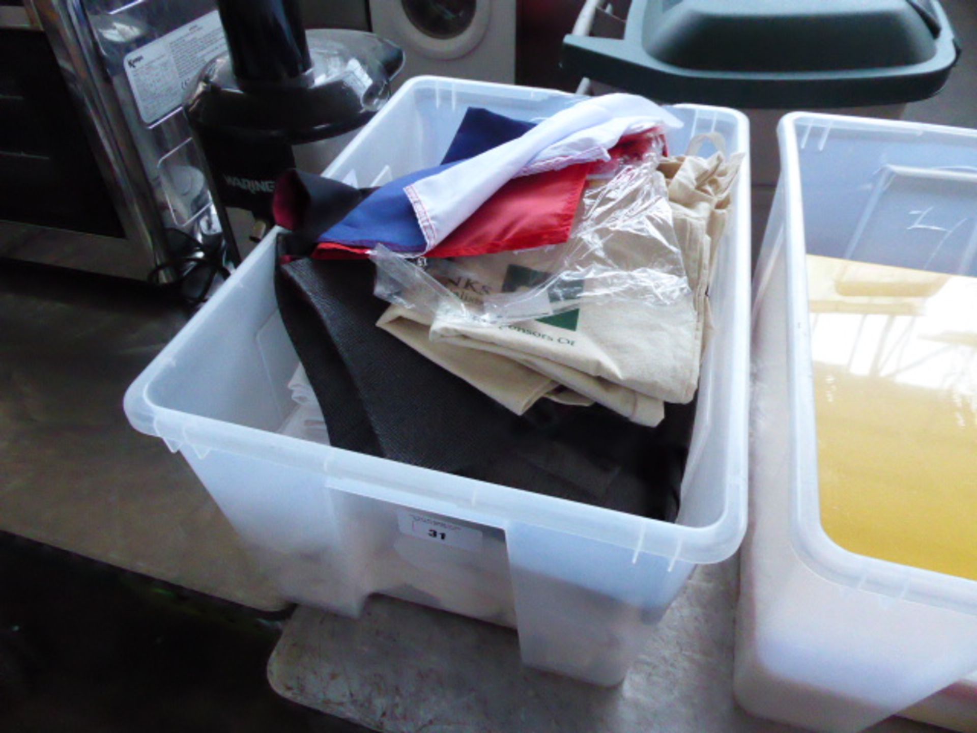 Box of linen including waistcoats, tablecloths, union flag, etc