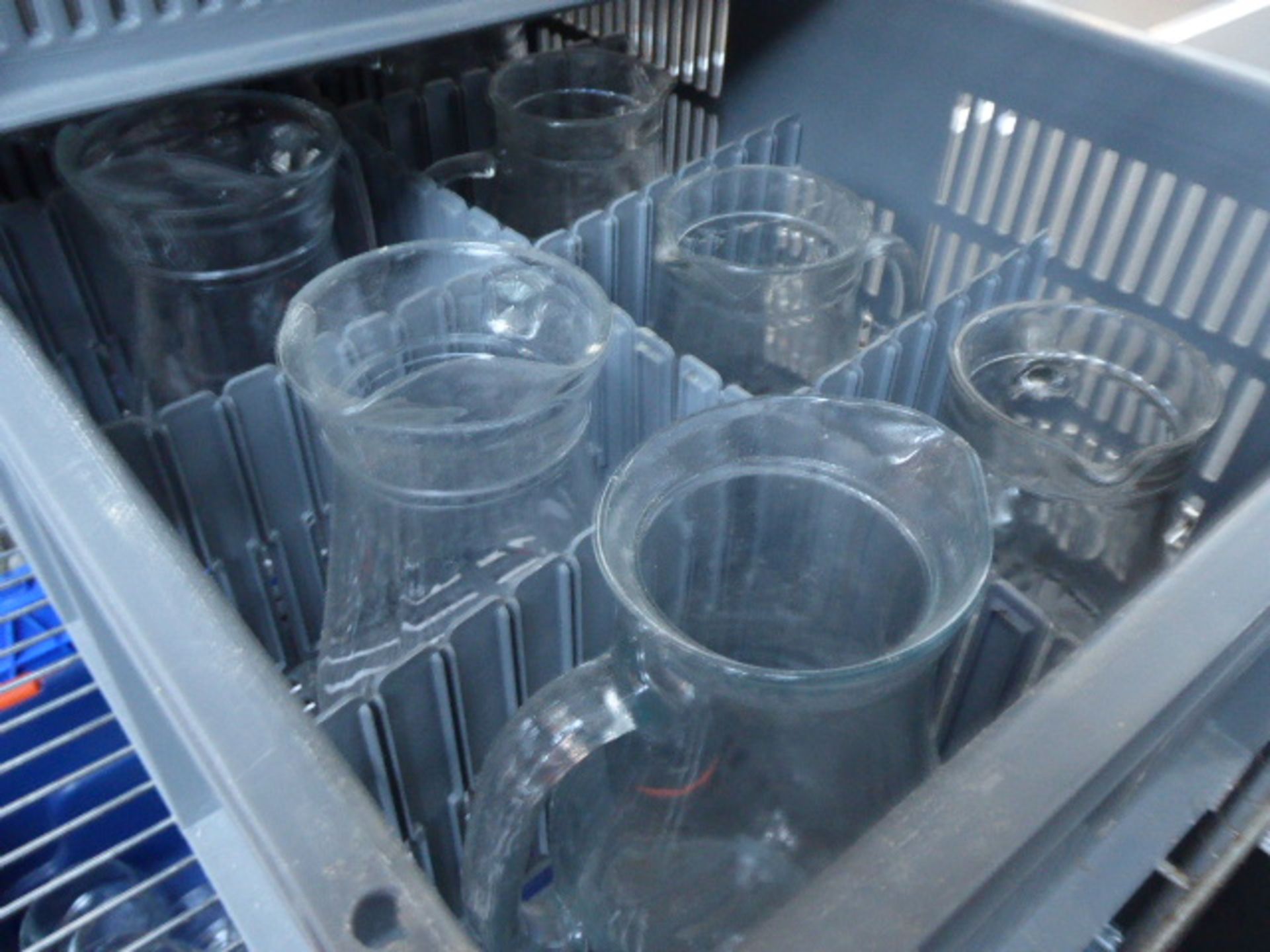 Three plastic stacking crates of glass jugs - Image 2 of 2