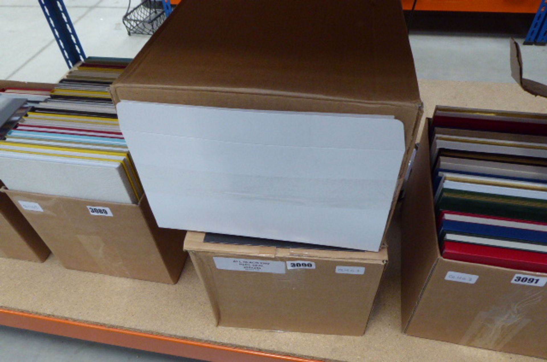 Two boxes containing card envelopes