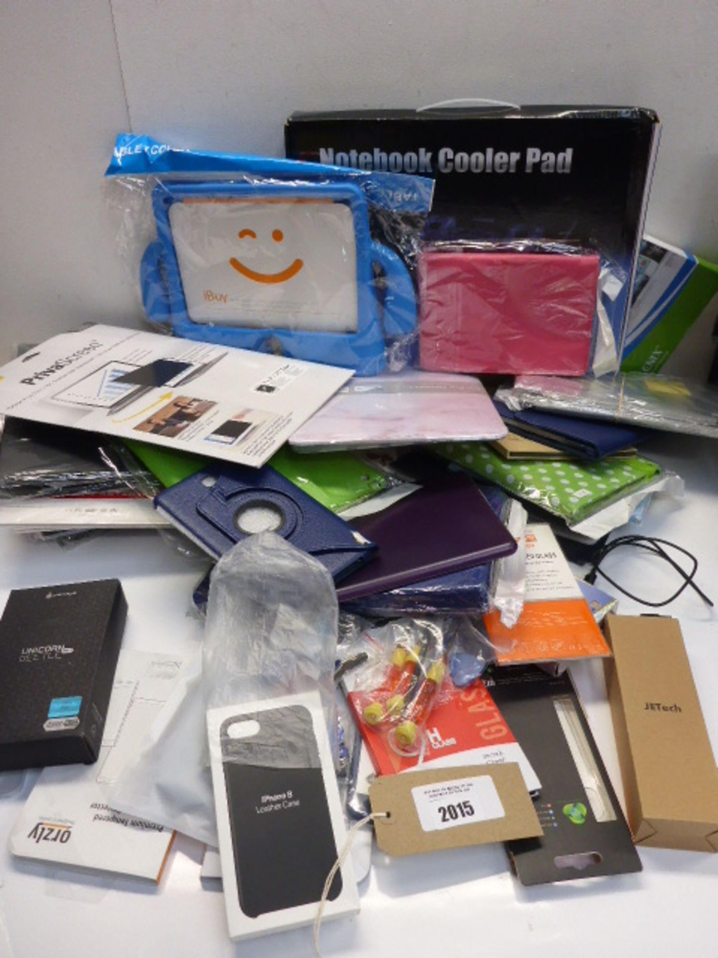 Large bag of iPad & mobile phone covers, screen savers, notebook cooling pad etc.