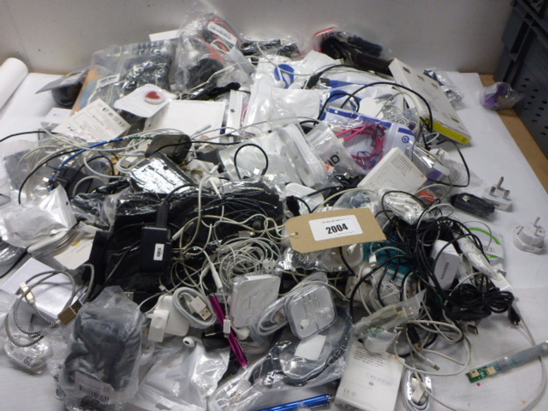 Bag containing large quantity of mobile phone accessories to include power banks, lightning