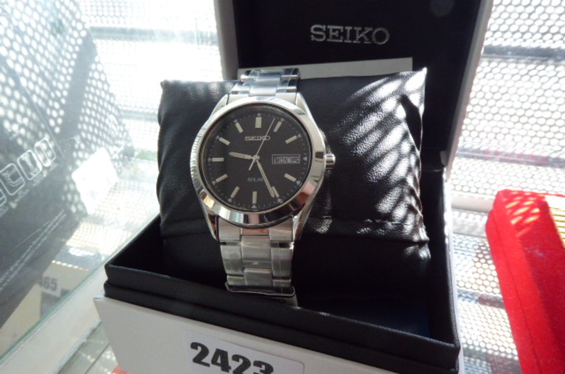 Seiko solar stainless steel wrist watch with paperwork in box