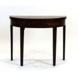 A 19th century mahogany, strung and crossbanded tea table on square tapering legs, w.