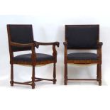 A pair of late 19th century French walnut and upholstered armchairs with figural arms modelled as
